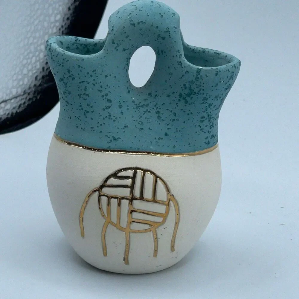 Native American style ceramic wedding vase with a southwest theme.